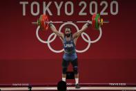 Harrison James Maurus of the United States competes in the men's 81kg weightlifting event, at the 2020 Summer Olympics, Saturday, July 31, 2021, in Tokyo, Japan. (AP Photo/Luca Bruno)