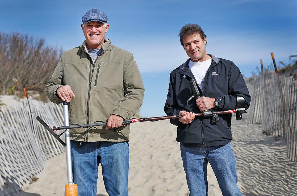 Lou Asci, of Marshfield, right, with friend Mike Chorzewski at Rexhame Beach in Marshfield.