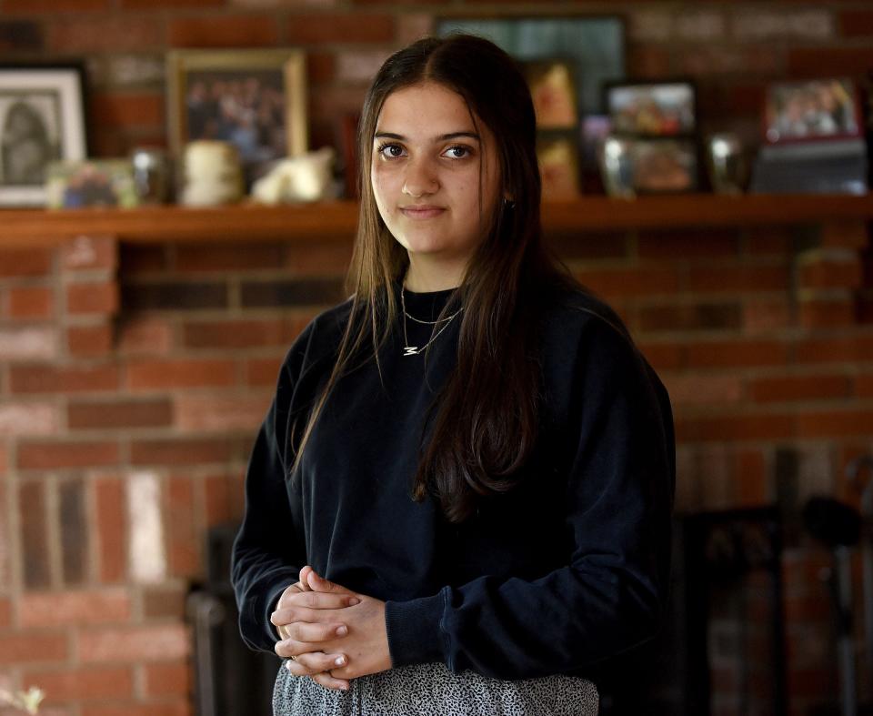 Mia Flegal at her Nashua home on June 10, 2022. She has struggled with anxiety and is now helping younger students with mental health.