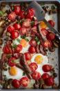 <p>A sheet pan, a 400 degree oven, and 15 minutes is all it takes to make this <a rel="nofollow noopener" href="https://www.womansday.com/food-recipes/food-drinks/g22887020/breakfast-ideas-with-eggs/" target="_blank" data-ylk="slk:clean-out-the-fridge breakfast creation;elm:context_link;itc:0;sec:content-canvas" class="link ">clean-out-the-fridge breakfast creation</a>.</p><p><strong>Get the recipe at <a rel="nofollow noopener" href="https://www.womansday.com/food-recipes/food-drinks/a16764362/english-breakfast-tray-bake-recipe/" target="_blank" data-ylk="slk:Woman's Day;elm:context_link;itc:0;sec:content-canvas" class="link ">Woman's Day</a>.</strong></p>