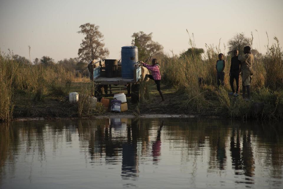 The Okavango River is the only source of water for many comunities like this one, in Angola. The kids are collecting water in the ox wagon at sunset for their families. 

The Okavango Delta is a world heritage site and home to many of the most iconic large mammals left on Earth, including the largest herd of elephants in the world. It is also a vital lifeline for almost a million people.