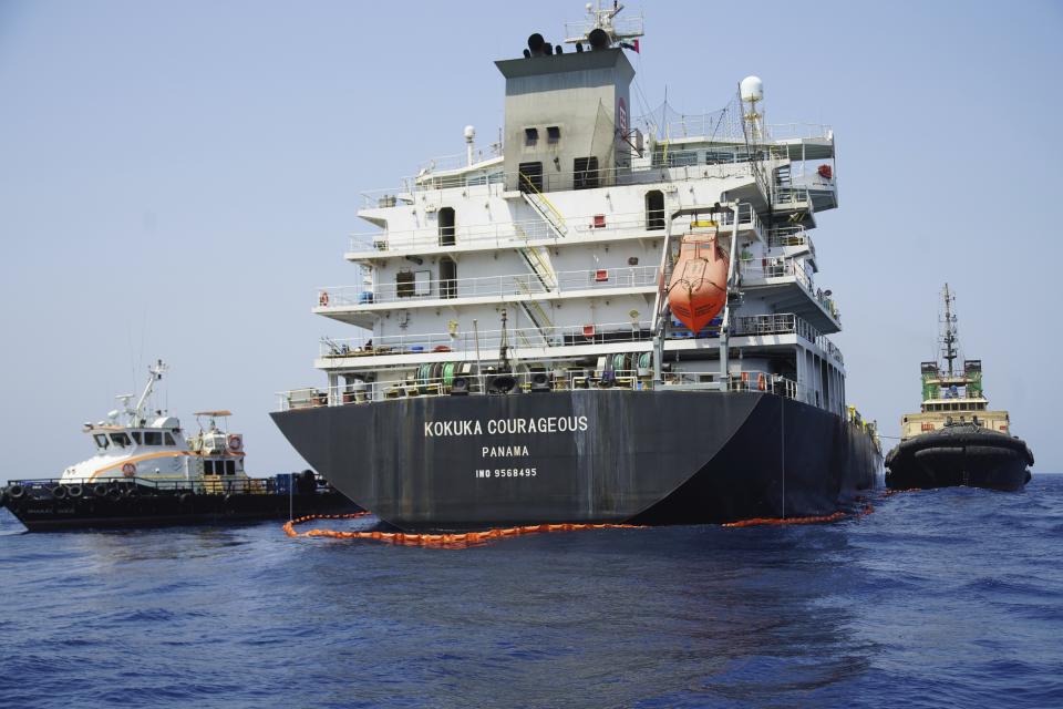 The damaged Panama-flagged, Japanese owned oil tanker Kokuka Courageous is anchored off Fujairah, United Arab Emirates, Wednesday, June 19, 2019. The limpet mines used to attack the oil tanker near the Strait of Hormuz bore "a striking resemblance" to similar mines displayed by Iran, a U.S. Navy explosives expert said Wednesday. Iran has denied being involved. (AP Photo/Fay Abuelgasim)