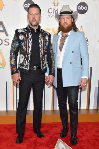 <p>Jason Davis/WireImage</p> T.J. Osborne and John Osborne of Brothers Osborne