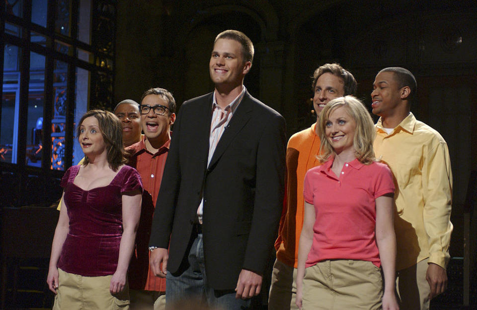 Tom Brady delivering his monologue alongside the cast of "SNL"