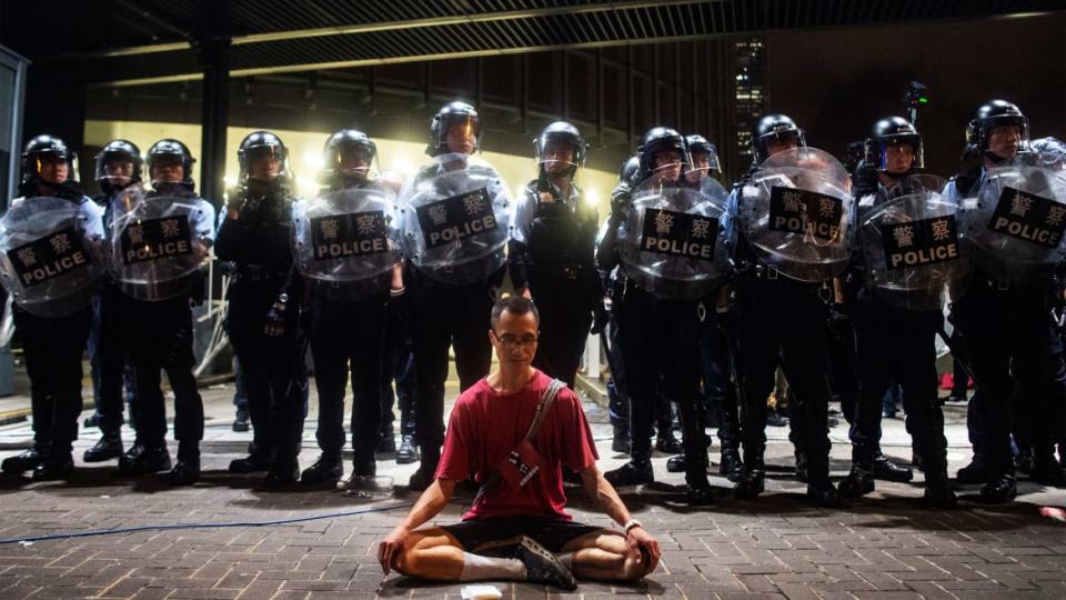 <div class="inline-image__title">1148741209</div> <div class="inline-image__caption"><p>Police gather at a rally against a controversial extradition law proposal in Hong Kong early on June 10, 2019. </p></div> <div class="inline-image__credit">PHILIP FONG / AFP</div>
