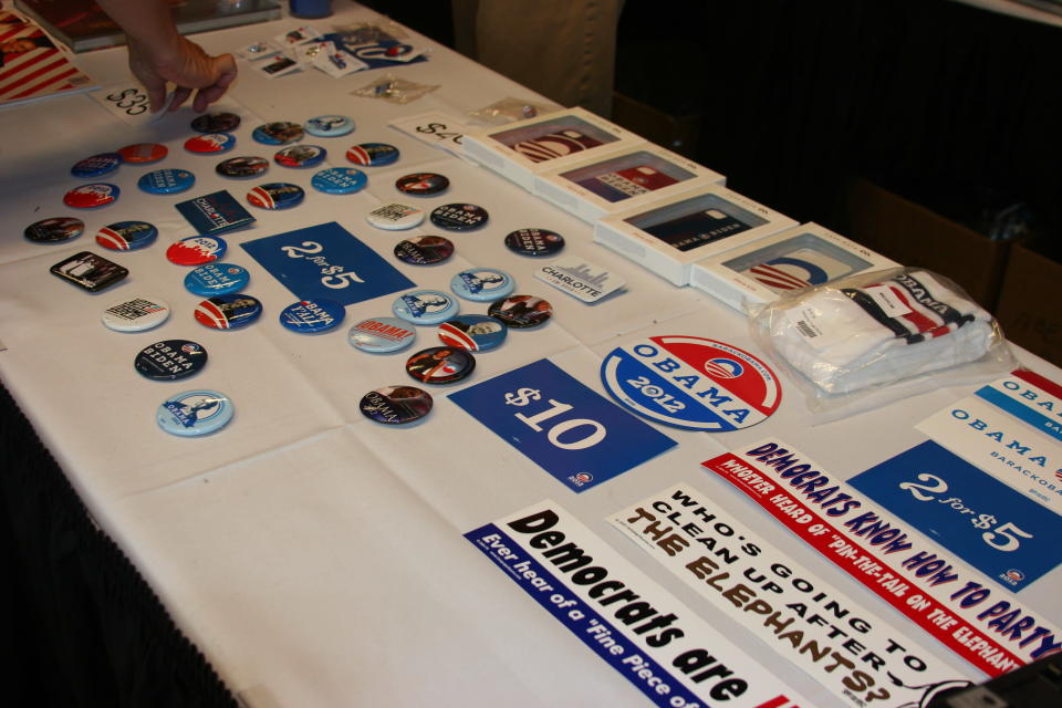 Vendors sell buttons and bumper stickers in the arena at the Democratic National Convention on Thursday Sept. 6, 2012. (Torrey AndersonSchoepe/Yahoo! News)