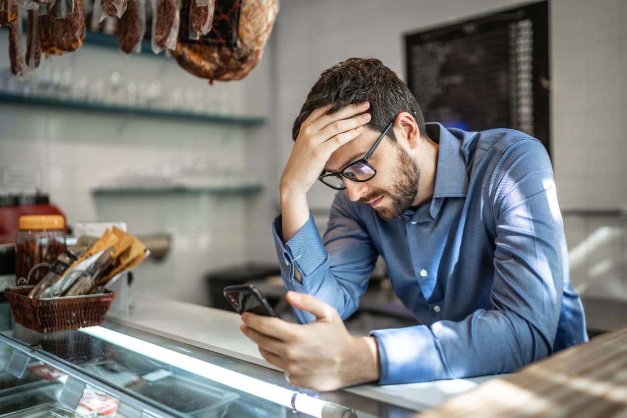 Worried small business owner. Credit: Getty.