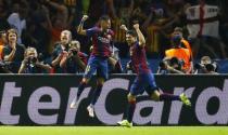 Barcelona's Neymar celebrates with Luis Suarez after scoring a goal but it is later disallowed for handball. Reuters / Darren Staples