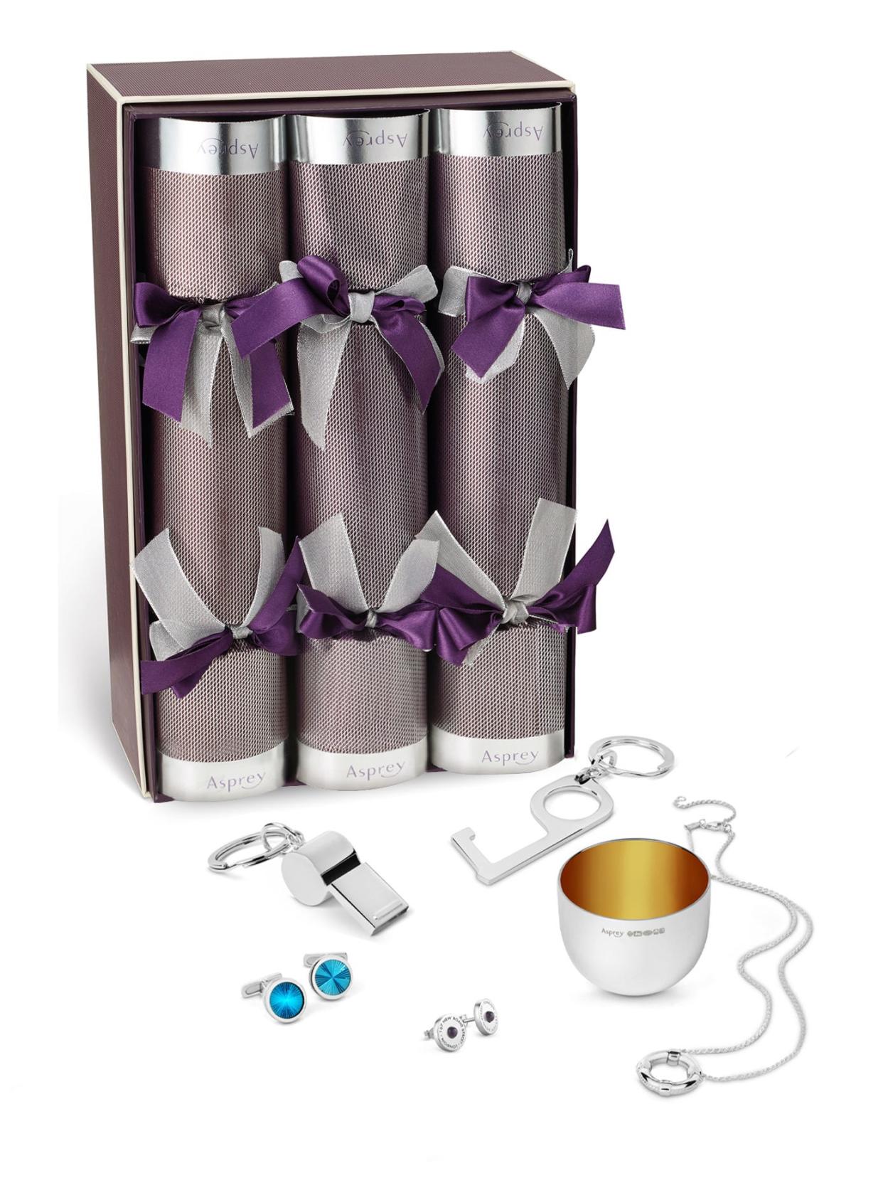 <p><a href="https://www.asprey.com/gb/en/product.html/luxury-christmas-crackers-set.html" rel="nofollow noopener" target="_blank" data-ylk="slk:Shop Now;elm:context_link;itc:0;sec:content-canvas" class="link rapid-noclick-resp">Shop Now</a></p><p>Set of Six Asprey Christmas Crackers</p><p>asprey.com</p><p>£1400.00</p>