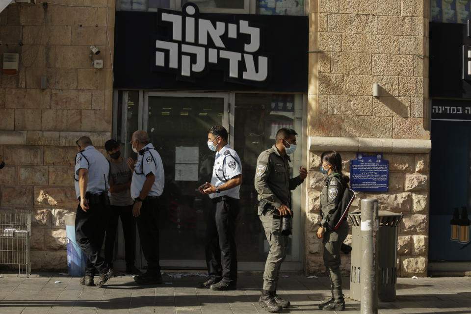 Israeli police inspect the scene of stabbing attack in Jerusalem's Central Bus Station Monday, Sept. 13, 2021. Israeli paramedics treated two people who were stabbed near Jerusalem's Central Bus Station by a suspected Palestinian assailant on Monday. (AP Photo/Maya Alleruzzo)