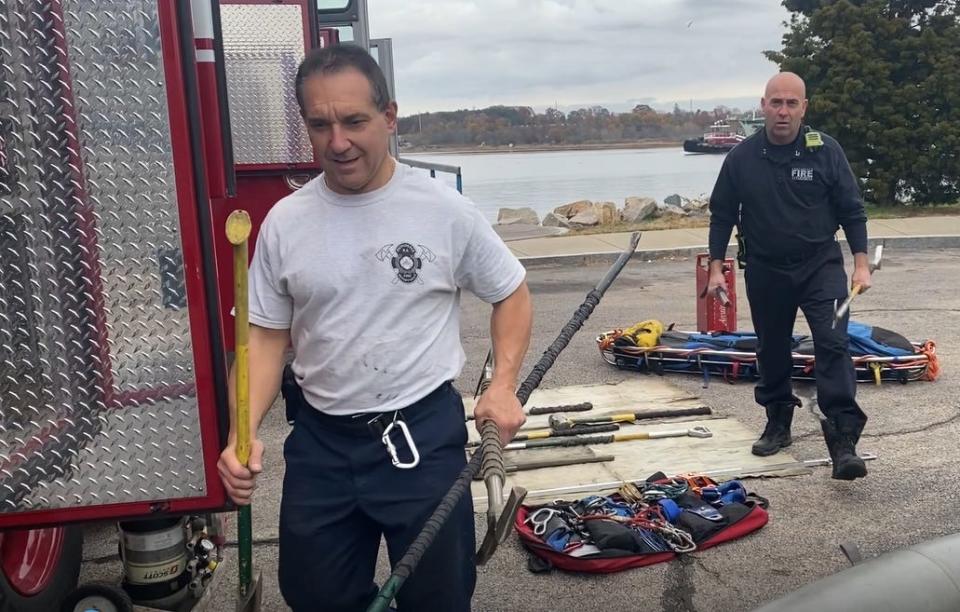 Firefighter Dan Rinaldi, left, and Capt. Chris Lannan with some of the gear used in rescue operations.