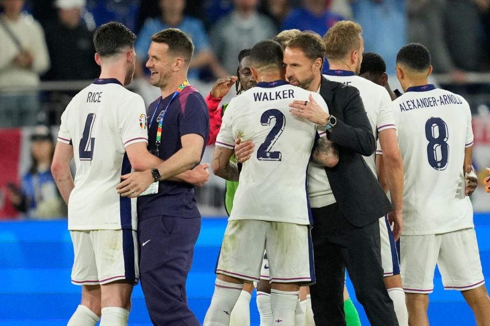 Gareth Southgate congratulates his players (AP)