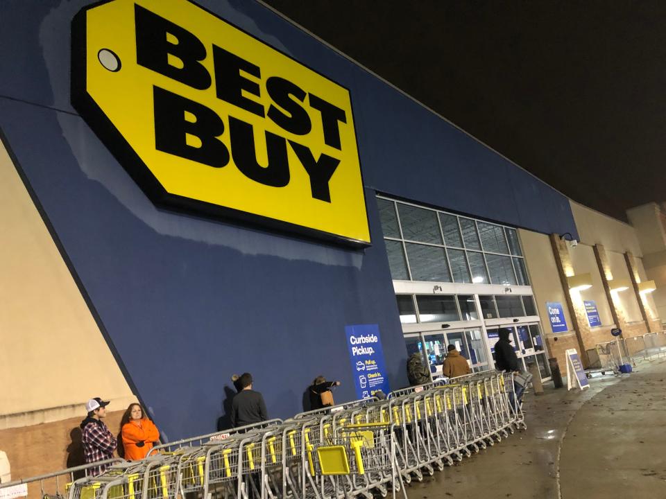 People social distanced in line while waiting for Best Buy to open on Black Friday.