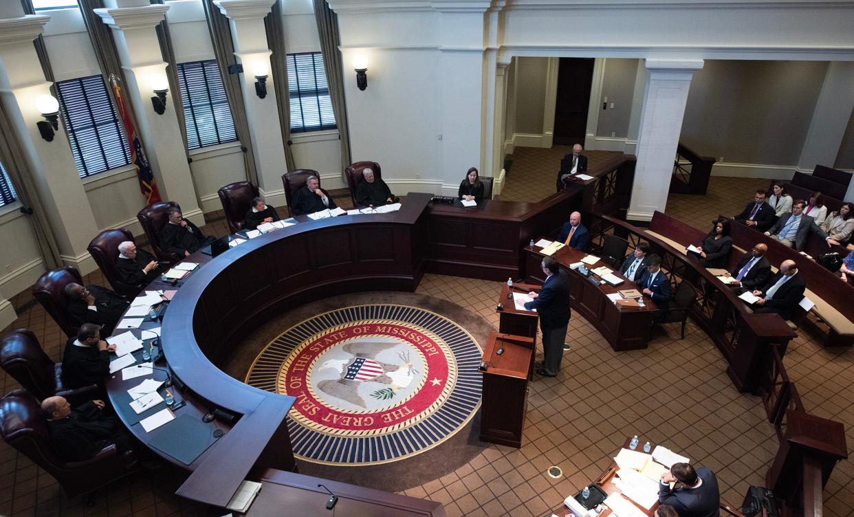 Mississippi Supreme Court justices listen to attorney Mark Nelson, representing Chief Justice Michael K. Randolph, during oral arguments regarding HB 1020 in Jackson on Wednesday. HB 1020 would significantly increase state control over Jackson's judicial system and policing.