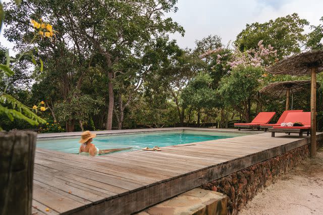 <p>Carmen Campos</p> Enjoying a swim in Pousada Trijunção's outdoor pool.