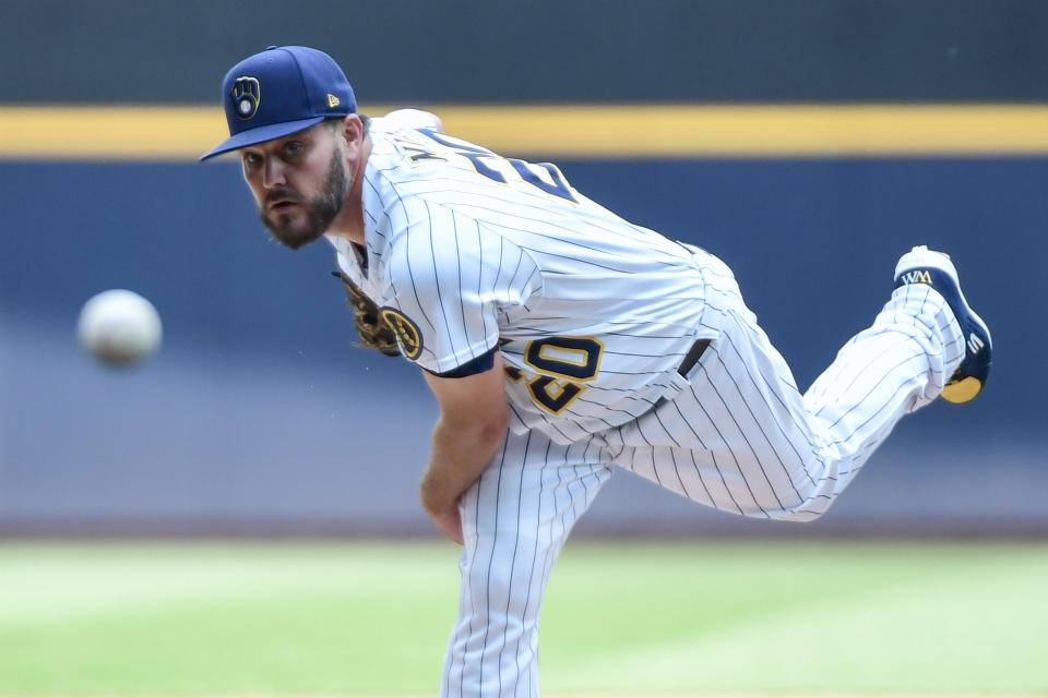 Wade Miley pitched five scoreless innings in his return to the mound Saturday to lead the Brewers to a 5-0 victory over the Pirates at American Family Field.