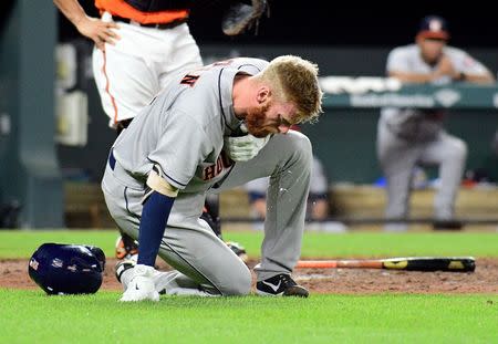 Jul 22, 2017; Baltimore, MD, USA; Houston Astros third baseman Colin Moran (19) reacts after fouling a ball off his face in the sixth inning against the Baltimore Orioles at Oriole Park at Camden Yards. Evan Habeeb-USA TODAY Sports