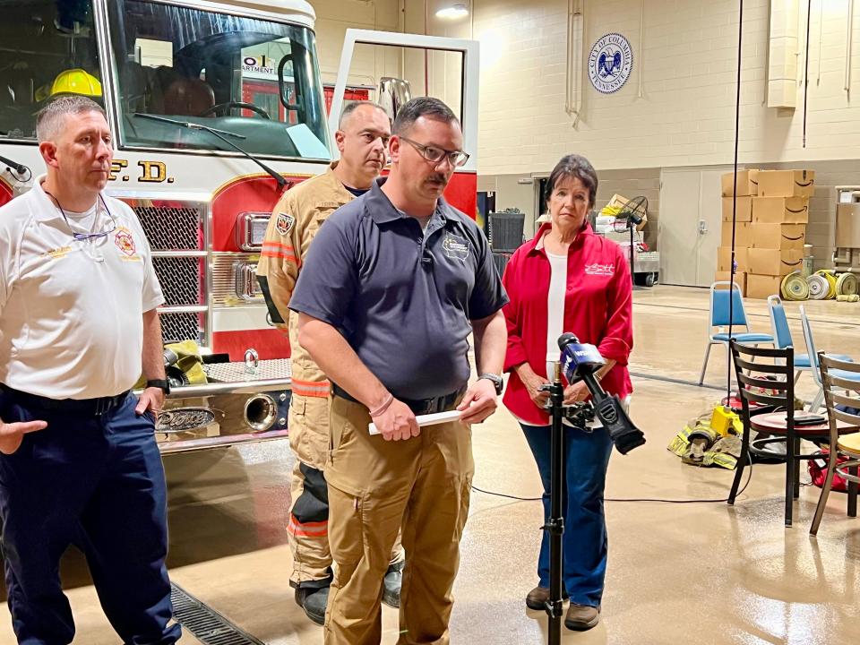 Jeff Hardy (center), Maury County Director of the Office of Emergency Management, briefs media about the tornado that touched down in eastern Columbia on Bear Creek Pike near the Interstate 65 junction. He stands with Chris Cummins (left) interim Columbia Fire Chief and Maury County Mayor Sheila Butt at Fire Station #3.