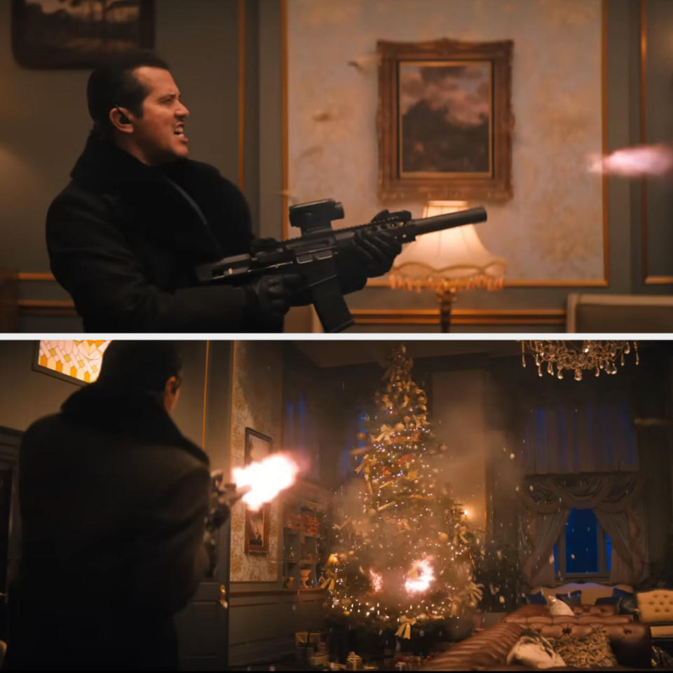 John Leguizamo as a mercenary firing a machine gun