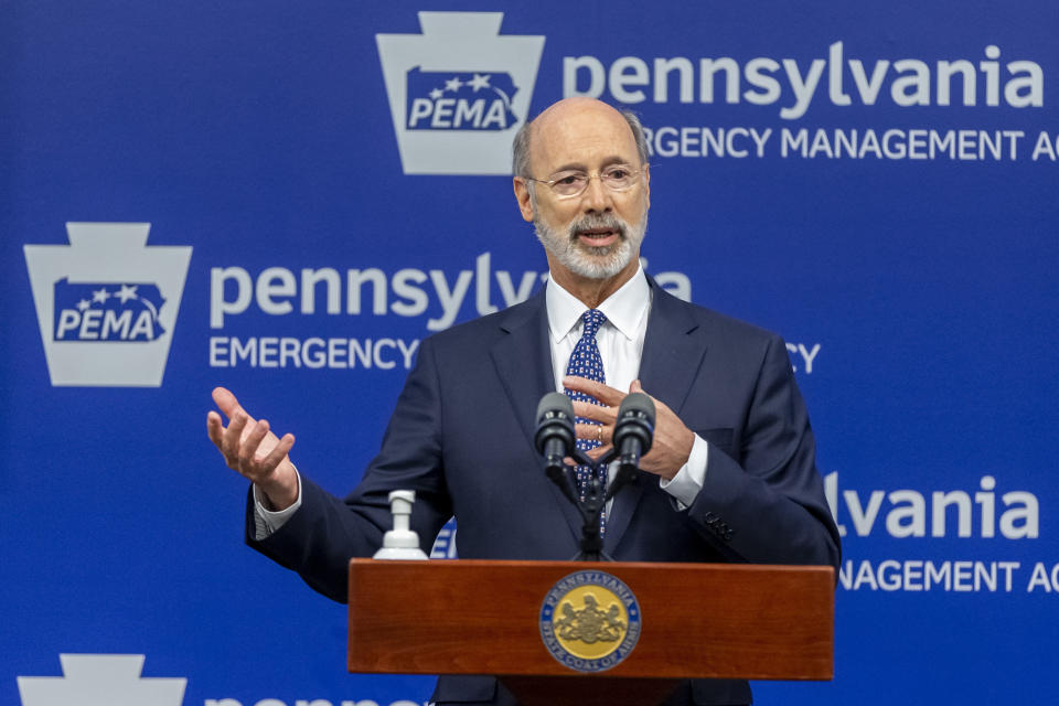 FILE - In this May 29, 2020, file photo, Pennsylvania Gov. Tom Wolf meets with the media at The Pennsylvania Emergency Management Agency (PEMA) headquarters in Harrisburg, Pa. On Wednesday, Aug. 26, 2020, the Justice Department sent letters to the governors of Pennsylvania and three other Democratic-led states, seeking data on whether they violated federal law by ordering public nursing homes to accept recovering COVID-19 patients from hospitals, actions that have been criticized for potentially fueling the spread of the virus. (Joe Hermitt/The Patriot-News via AP, File)
