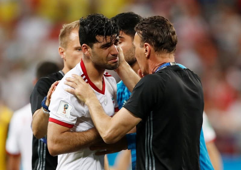 <p>Iran’s Mehdi Taremi looks dejected after the match. REUTERS/Matthew Childs </p>