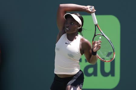 Mar 26, 2018; Key Biscayne, FL, USA; Sloane Stephens of the United States hits a forehand against Garbine Muguruza of Spain (not pictured) on day seven of the Miami Open at Tennis Center at Crandon Park. Stephens won 6-3, 6-4. Mandatory Credit: Geoff Burke-USA TODAY Sports