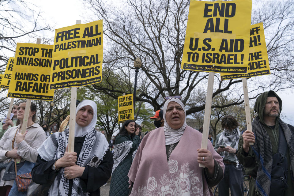 Protesters demonstrate in support of Palestinians at Dupont Circle in Washington, Saturday, March 30, 2024. (AP Photo/Jose Luis Magana)