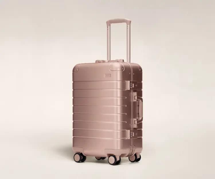 <p><a href="https://go.redirectingat.com?id=74968X1596630&url=https%3A%2F%2Fwww.awaytravel.com%2Fen-uk%2Fsuitcases%2Faluminum-carry-on&sref=https%3A%2F%2F" rel="nofollow noopener" target="_blank" data-ylk="slk:Shop Now;elm:context_link;itc:0;sec:content-canvas" class="link ">Shop Now</a></p><p>The Carry-On: Aluminum Edition</p><p>awaytravel.com</p><p>$500.00</p><span class="copyright">Away </span>