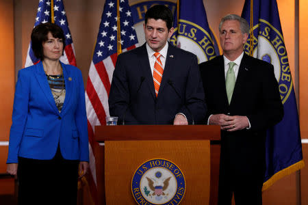 U.S. House Speaker Paul Ryan (R-WI), flanked by Representative Cathy McMorris Rodgers (R-WA) and Majority Leader Kevin McCarthy (R-CA), addresses reporters in Washington, U.S. January 17, 2018. REUTERS/Jonathan Ernst