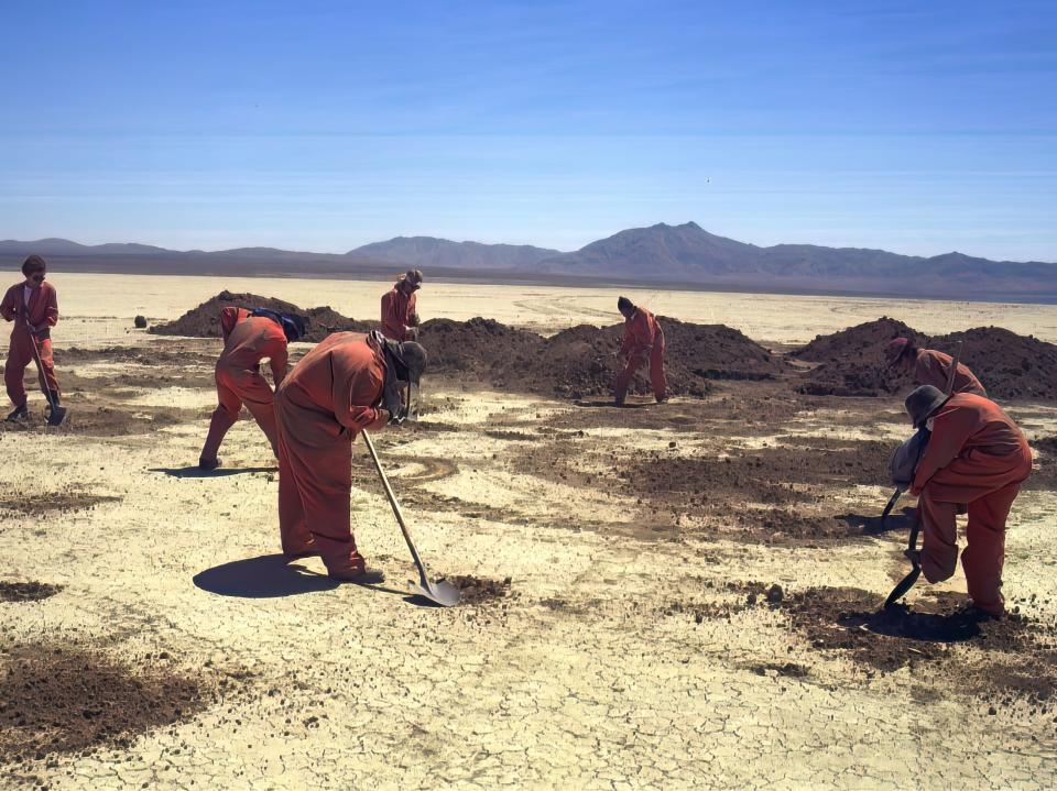 the kids digging holes in costume in holes