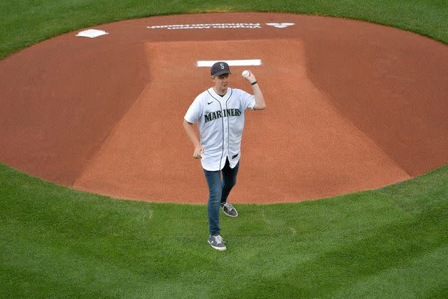 Ken Jennings throws out the first pitch before the game between the Seattle Mariners and the Texas Rangers on July 2, 2021, in Seattle. (Photo: Alika Jenner via Getty Images)