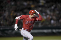 Los Angeles Angels' Shohei Ohtani runs after hitting a double against the Oakland Athletics during the sixth inning of a baseball game Friday, Sept. 1, 2023, in Oakland, Calif. (AP Photo/Godofredo A. Vásquez)