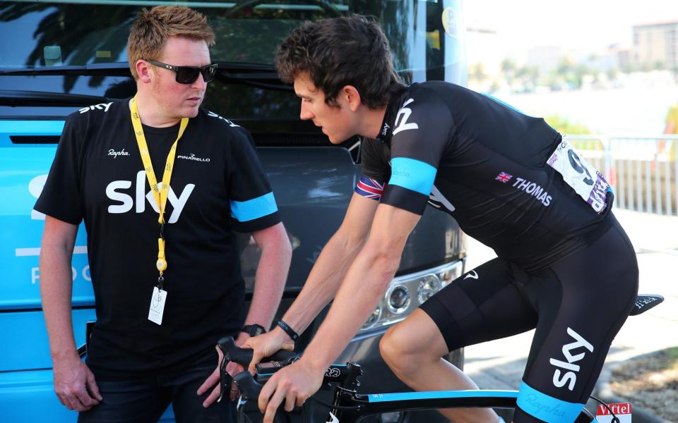 Geraint Thomas of Great Britain and Team Sky (R) talks to Ellingworth