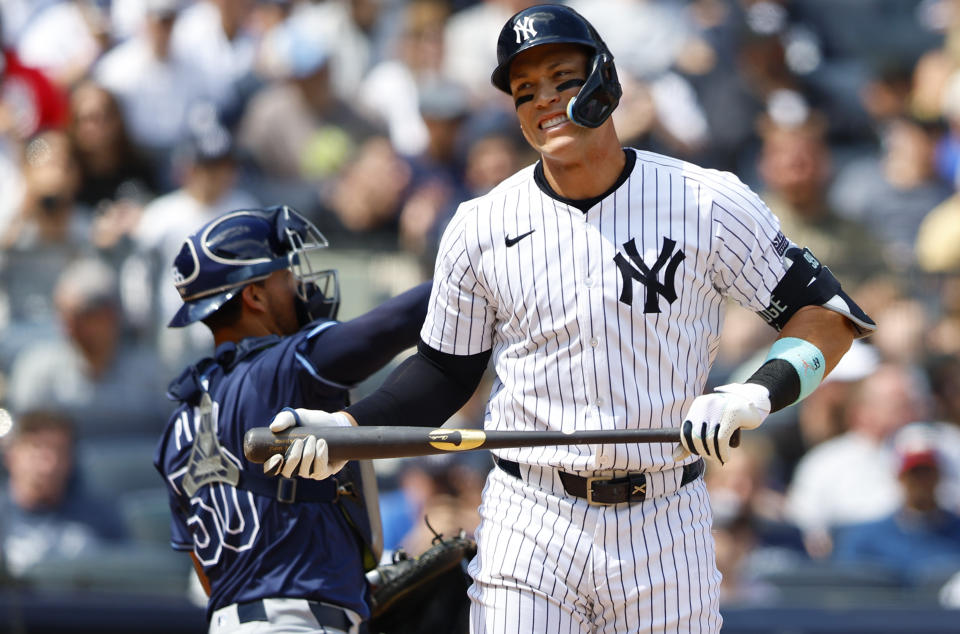 New York Yankees' Aaron Judge (99) reacts after striking out against the Tampa Bay Rays during the sixth inning inning of a baseball game, Saturday, April 20, 2024 in New York. (AP Photo/Noah K. Murray)