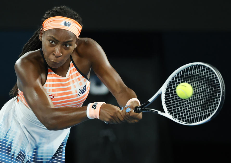 United States' Coco Gauff makes a backhand return to Ukraine's Elina Svitolina during their second round match at the Australian Open tennis championship in Melbourne, Australia, Thursday, Feb. 11, 2021.(AP Photo/Rick Rycroft)