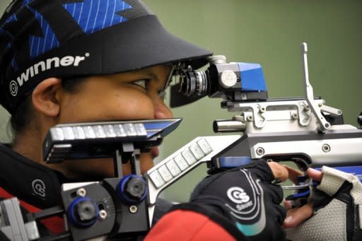 Malaysia's Nur Suryani Mohamad Taibi during a practice session at the Subang Jaya shooting field near Kuala Lumpur. The 2010 Commonwealth Games gold medallist and navy logistics officer is due in September, but that has not stopped her from competing in the Olympics