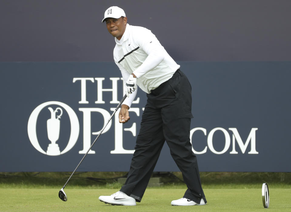 Tiger Woods of the United States watches his ball after playing off the 1st tee during the second round of the British Open Golf Championships at Royal Portrush in Northern Ireland, Friday, July 19, 2019.(AP Photo/Peter Morrison)