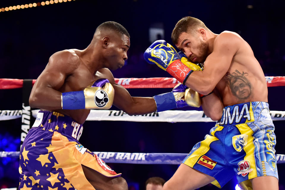 Guillermo Rigondeaux punches Vasiliy Lomachenko (R) during their Junior Lightweight bout at Madison Square Garden on December 9, 2017 in New York City. (Getty Images)