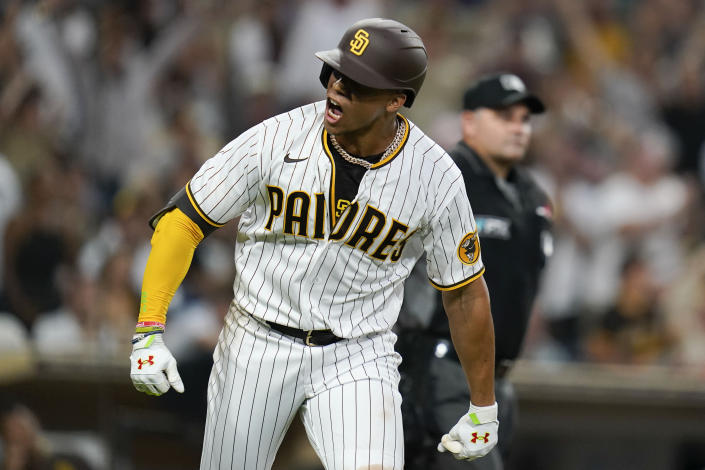 San Diego Padres' Juan Soto reacts after hitting a home run during the fourth inning of the team's baseball game against the San Francisco Giants, Tuesday, Aug. 9, 2022, in San Diego. (AP Photo/Gregory Bull)