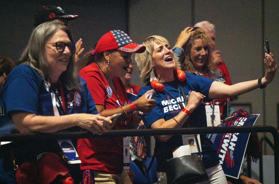 Spectators cheer with the announcement that Micah Beckwith is the Republican nominee for lieutenant governor Saturday, June 15, 2024, during the 2024 Indiana GOP State Convention in Indianapolis, Ind.