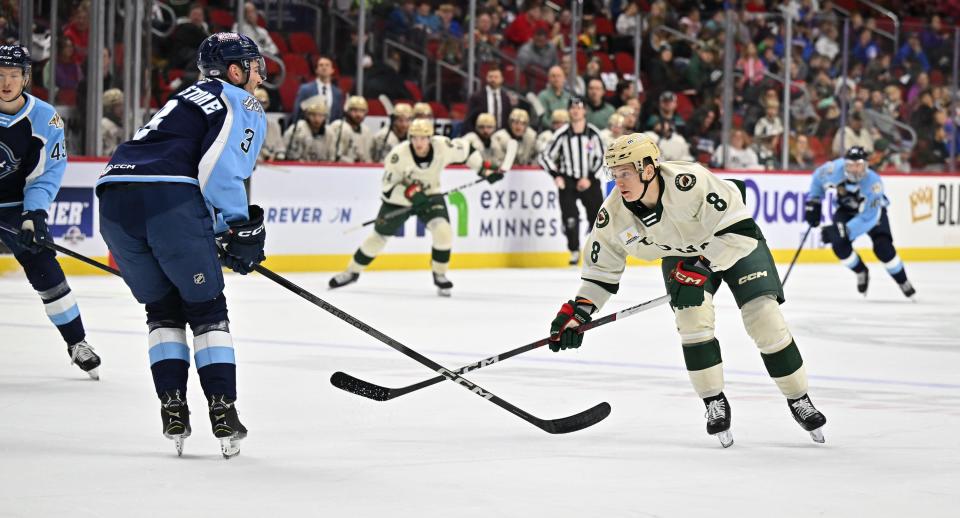 Pavel Novak goes up against a Milwaukee Admirals opponent during an Iowa Wild game on Nov. 2.