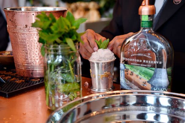 PHOTO: Bartender Ron Jones makes a mint julep before the Kentucky Derby at Churchill Downs in Louisville, Ky., May 6, 2017. (USA Today Sports via Reuters, FILE)