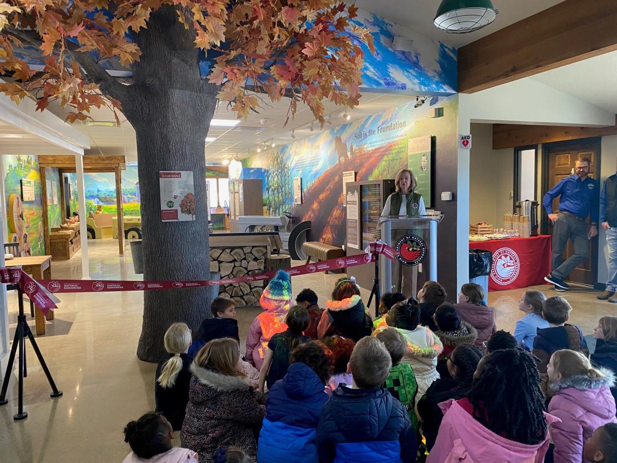 Ohio Department of Natural Resources Director Mary Mertz talked to St. Peter's School first- and second-grade students Tuesday before the ribbon cutting at Malabar Farm State Park's new Visitor Center exhibit.