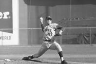 FILE - In this Oct. 4, 1969, file photo, New York Mets pitcher Tom Seaver throws against the Atlanta Braves in a National League playoff game in Atlanta. Fifty years after their improbable World Series championship, the New York Mets have climbed from near the bottom of the National League standings all the way into the playoff race. New York begins a pivotal series Tuesday night, Aug. 27, 2019, against the Chicago Cubs. (AP Photo/File)