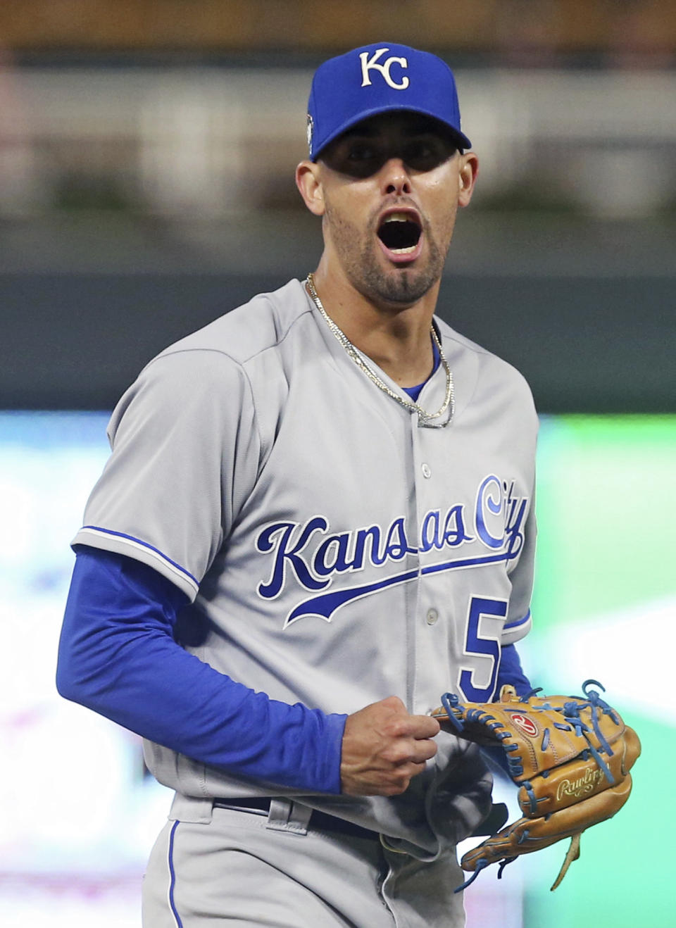 Kansas City Royals pitcher Jorge Lopez celebrates after striking out Minnesota Twins' Mitch Garver to keep a perfect game intact through the eighth inning of a baseball game Saturday, Sept. 8, 2018, in Minneapolis. Lopez gave up a walk and a hit in the ninth inning, and Lopez was pulled from the game. The Royals won 4-1. (AP Photo/Jim Mone)