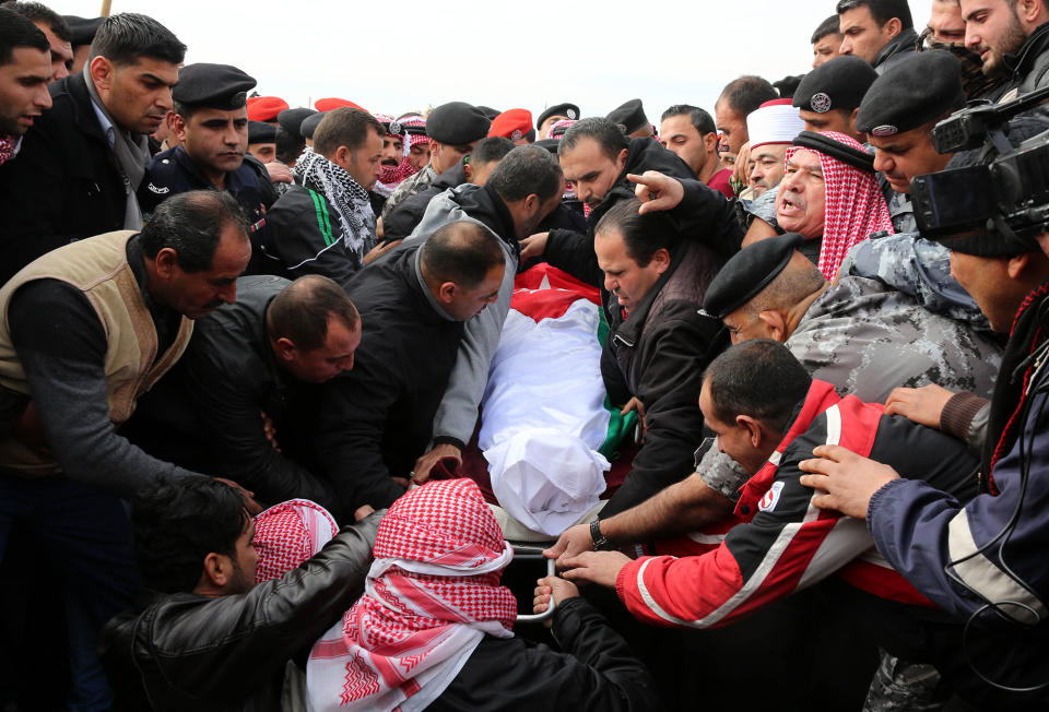 Jordanians mourn during a funeral in Shajara Village