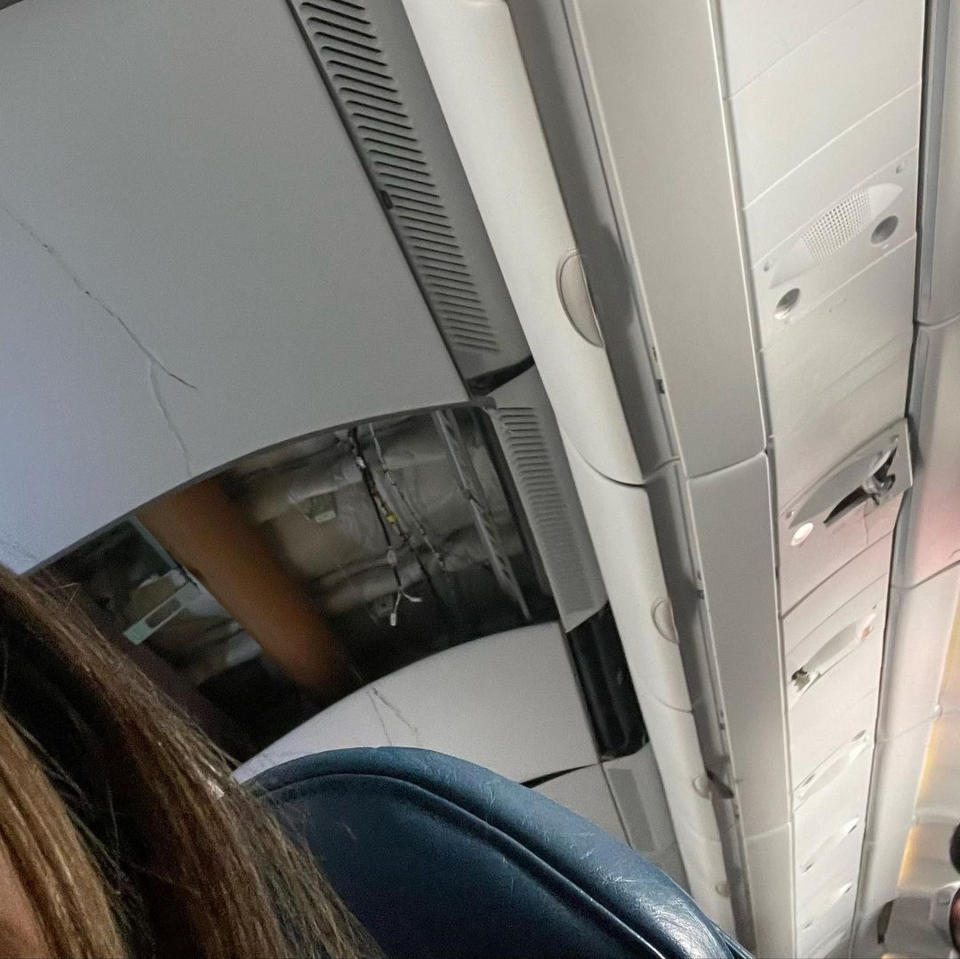 This mobile photo courtesy of passenger Jazmin Bitanga shows the interior of a Hawaiian Airlines plane on its flight from Phoenix to Honolulu, Sunday, Dec. 18, 2022, after severe turbulence rocked the flight. (Courtesy of Jazmin Bitanga via AP)