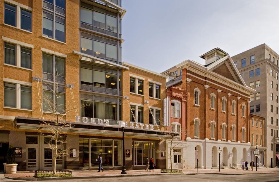 In this 2009 file photo released by Ford's Theatre shows the exterior of Ford's Theatre in Washington. Within 16 months of the assassination, the theater was closed and the federal government turned the building into office space, but it became a working theater again in the 1960s and the interior was recreated to show what it looked like the night Lincoln was shot. (AP Photo/Ford's Theatre, Maxwell MacKenzie)