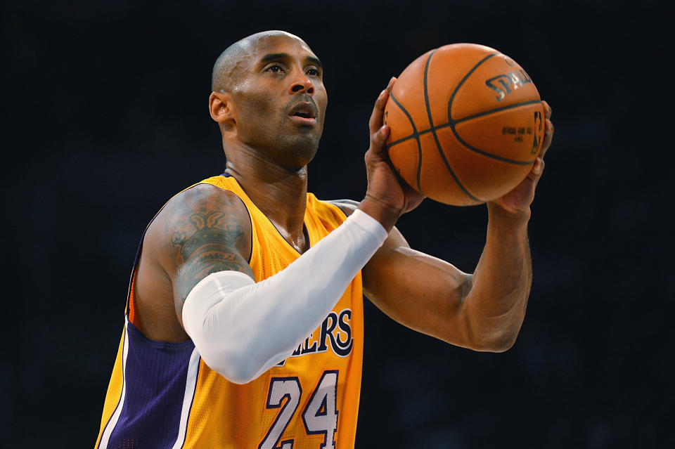 LOS ANGELES, CA - DECEMBER 09:  Kobe Bryant #24 of the Los Angeles Lakers shoots a free throw during a game against the Sacramento Kings at Staples Center on December 9, 2014 in Los Angeles, California.   NOTE TO USER: User expressly acknowledges and agrees that, by downloading and or using this photograph, User is consenting to the terms and conditions of the Getty Images License Agreement.  (Photo by Jonathan Moore/Getty Images)