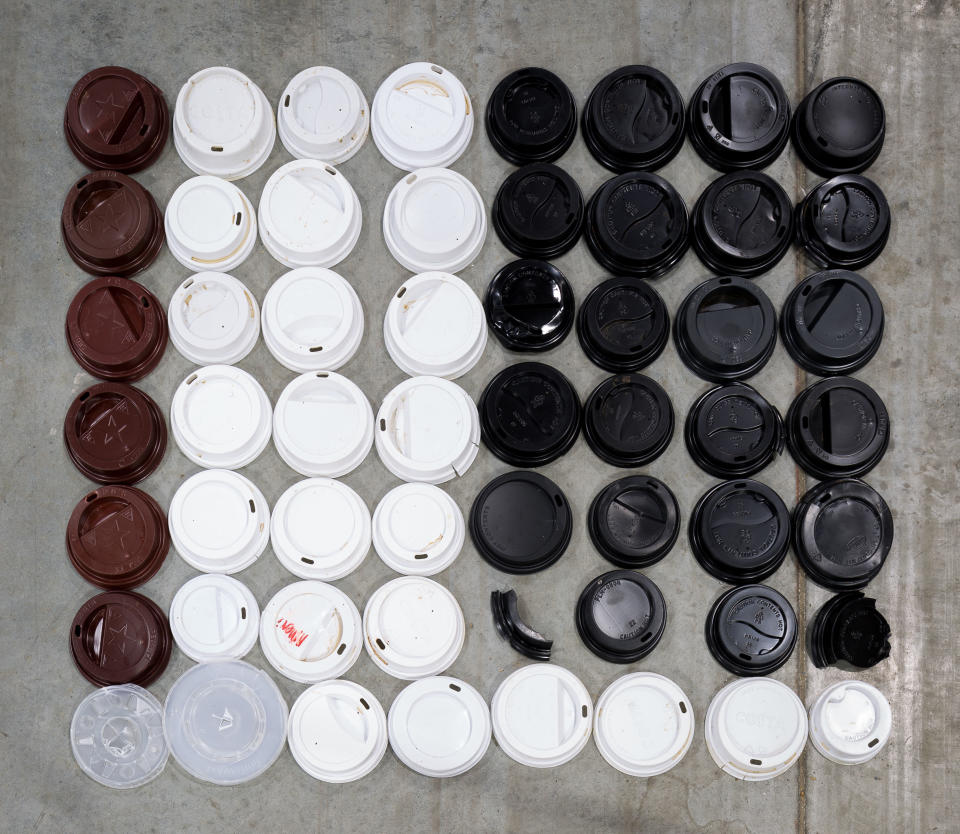 That’s a latte plastic: Coffee cup lids collected by Mr Webb. (PA)